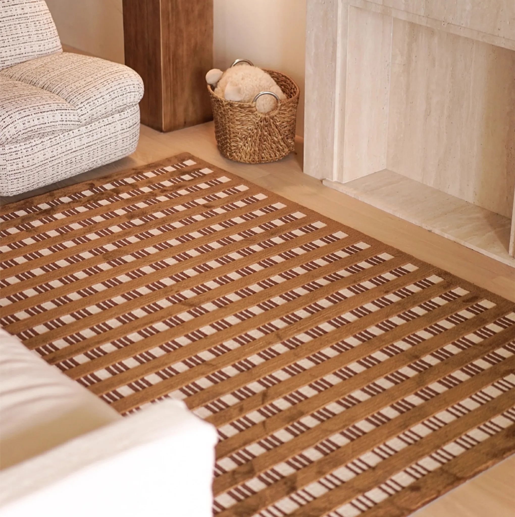 Amber Brown and Cream Checkered Textured Rug on a wooden floor with a chair and basket in the background