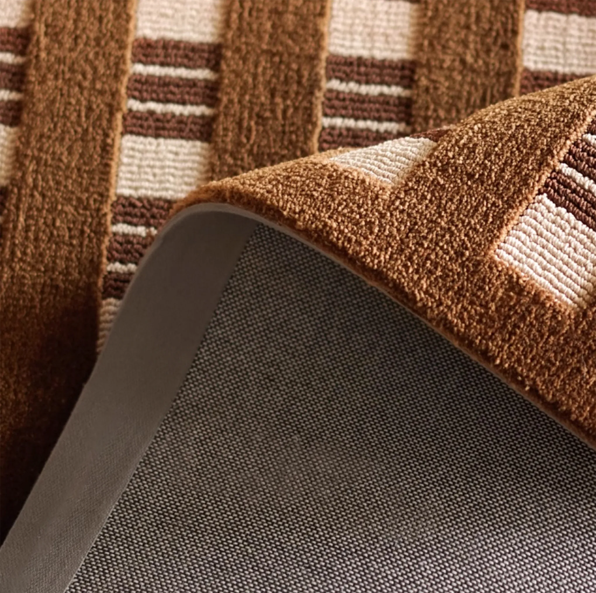 Close-up of the texture of Amber Brown and Cream Checkered Textured Modern Rug by Housenfriends