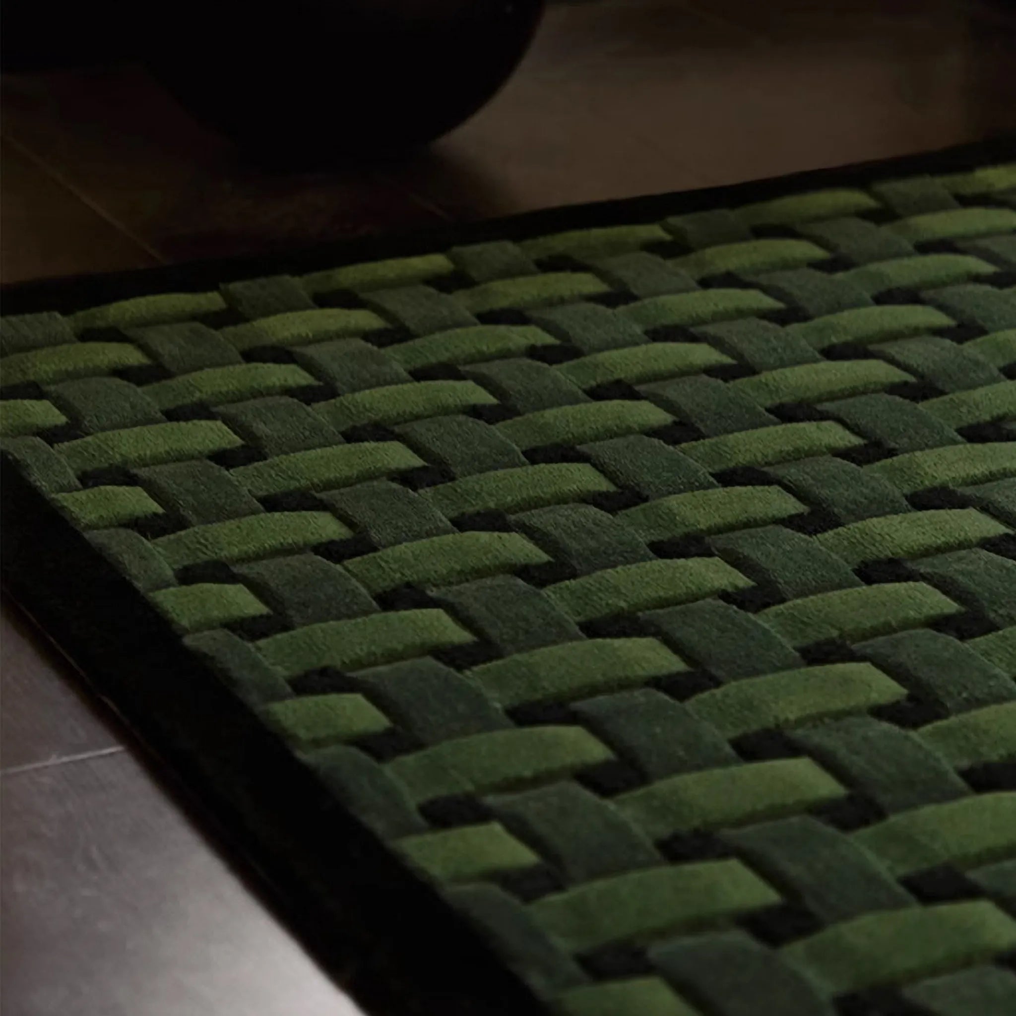 Close-up of Bambusa Green Woven Grid High Low Tufted Wool Rug by Housenfriends