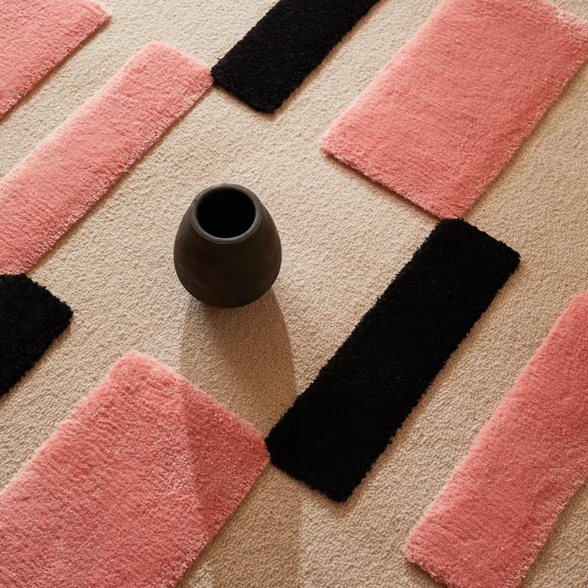 Closer view of Blush Pink Black Ivory Checkered High Low Wool Rug by Housenfriends