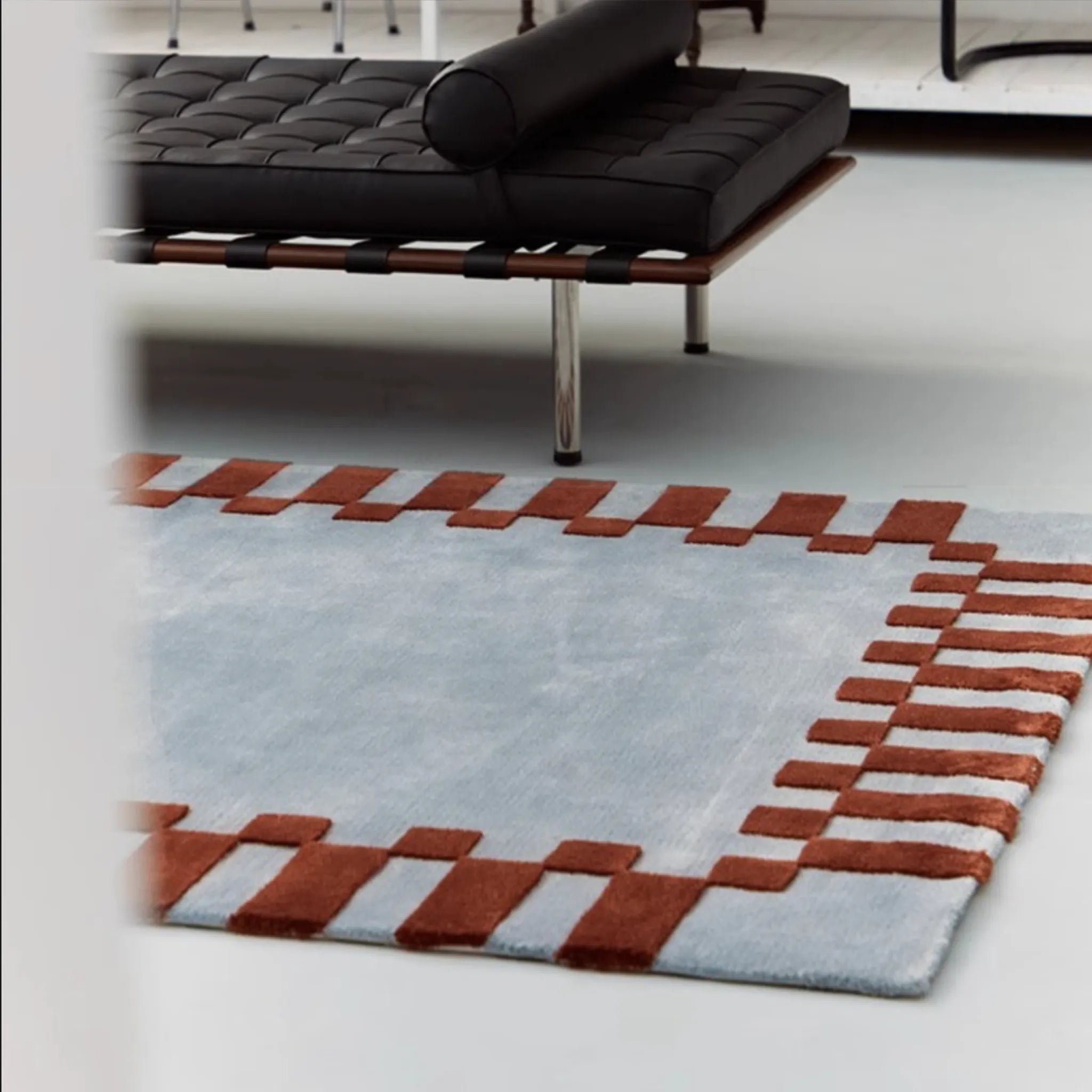 Acropolis Slate Blue and Red High Low Wool Rug by Housenfriends in a living room