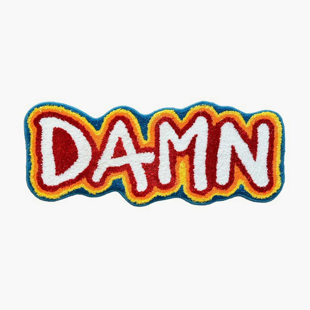 Housenfriends hand-tufted rainbow runner with the word 'DAMN' on a white background in red, orange, yellow, blue, and white.