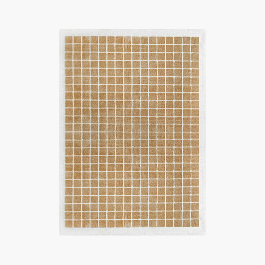 White rug with caramel gold grid pattern by Housenfriends