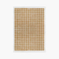 White rug with caramel gold grid pattern by Housenfriends