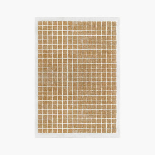 White rug with caramel gold grid pattern by Housenfriends