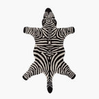 Zibi small zebra animal shaped rug in black and white by Housenfriends on white background