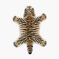 Tibi small tiger animal shaped wool rug in beige, black and brown by Housenfriends on white background