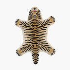 Tibi small tiger animal shaped wool rug in beige, black and brown by Housenfriends on white background