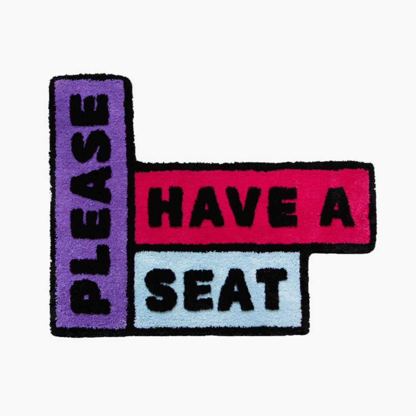 Multicolored rug with 'Please Have a Seat' text by Housenfriends on white background