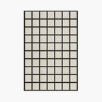 Studio Black and Cream Modern Grid Cut Pile Rug by Housenfriends on a white background