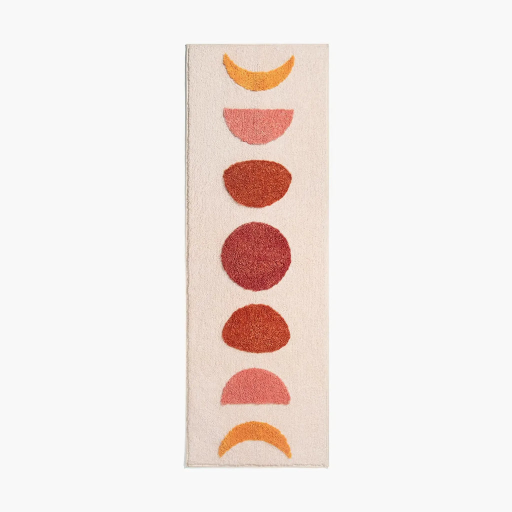 Eclipse pink and orange semi-circle shaggy runner rug by Housenfriends on white background