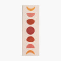Eclipse pink and orange semi-circle shaggy runner rug by Housenfriends on white background