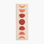Eclipse pink and orange semi-circle shaggy runner rug by Housenfriends on white background
