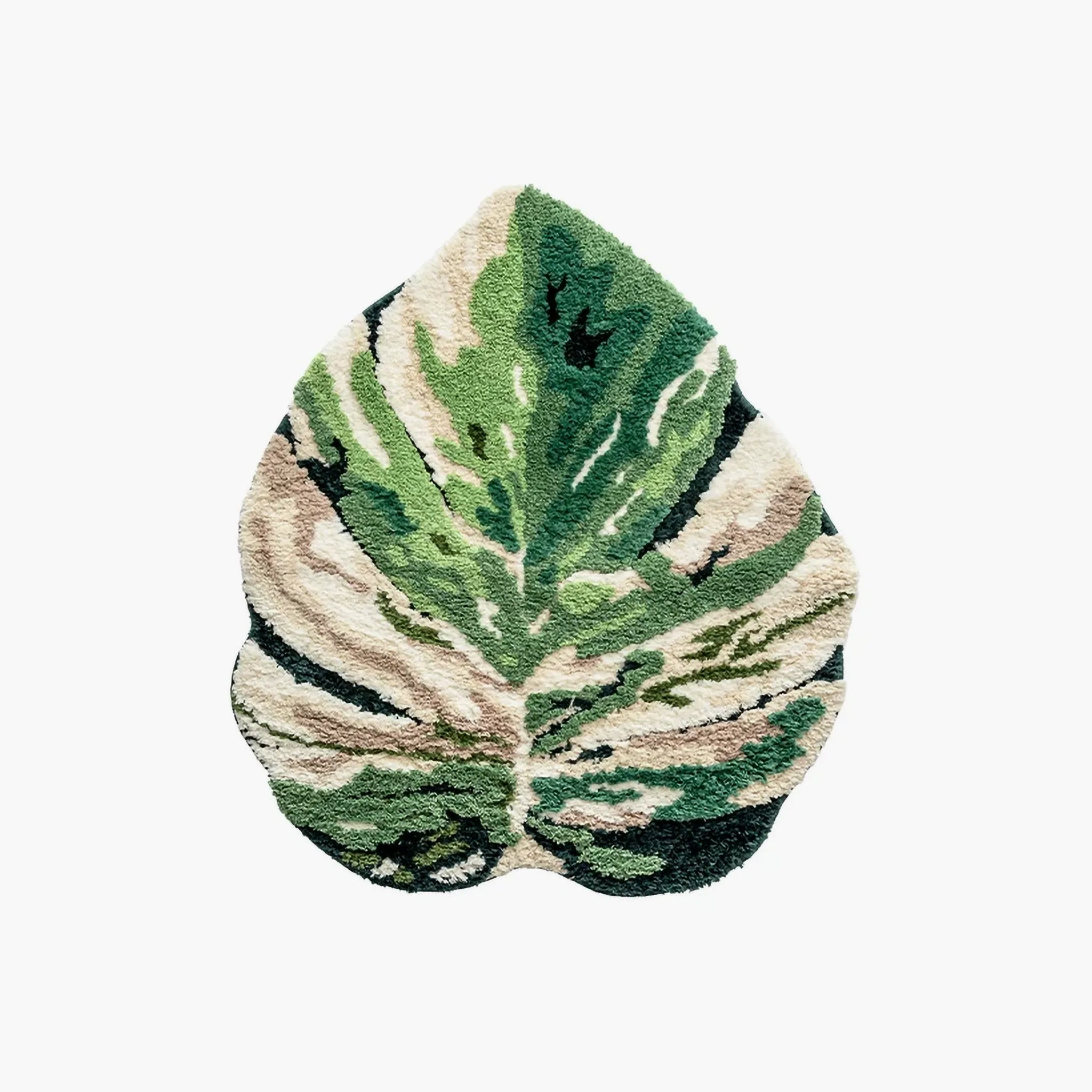 Cassia Forest Green Monstera Leaf Irregular Tufted Rug, full leaf silhouette on white background