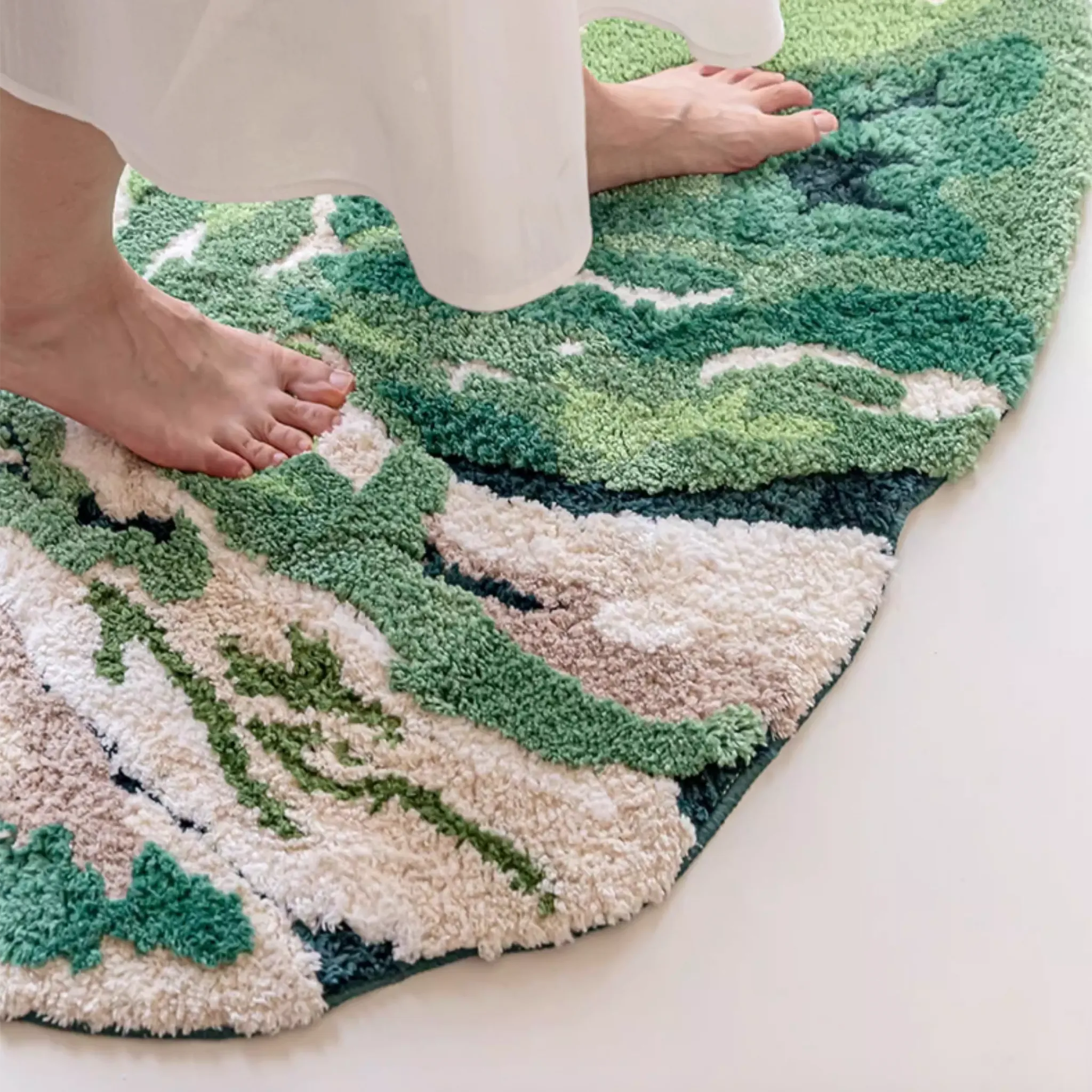 Cassia Forest Green Monstera Leaf Irregular Tufted Rug, feet stepping on the plush tufted pile