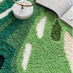 Cassia Forest Green Monstera Leaf Irregular Tufted Rug, close-up of the tufted texture and leaf vein carving