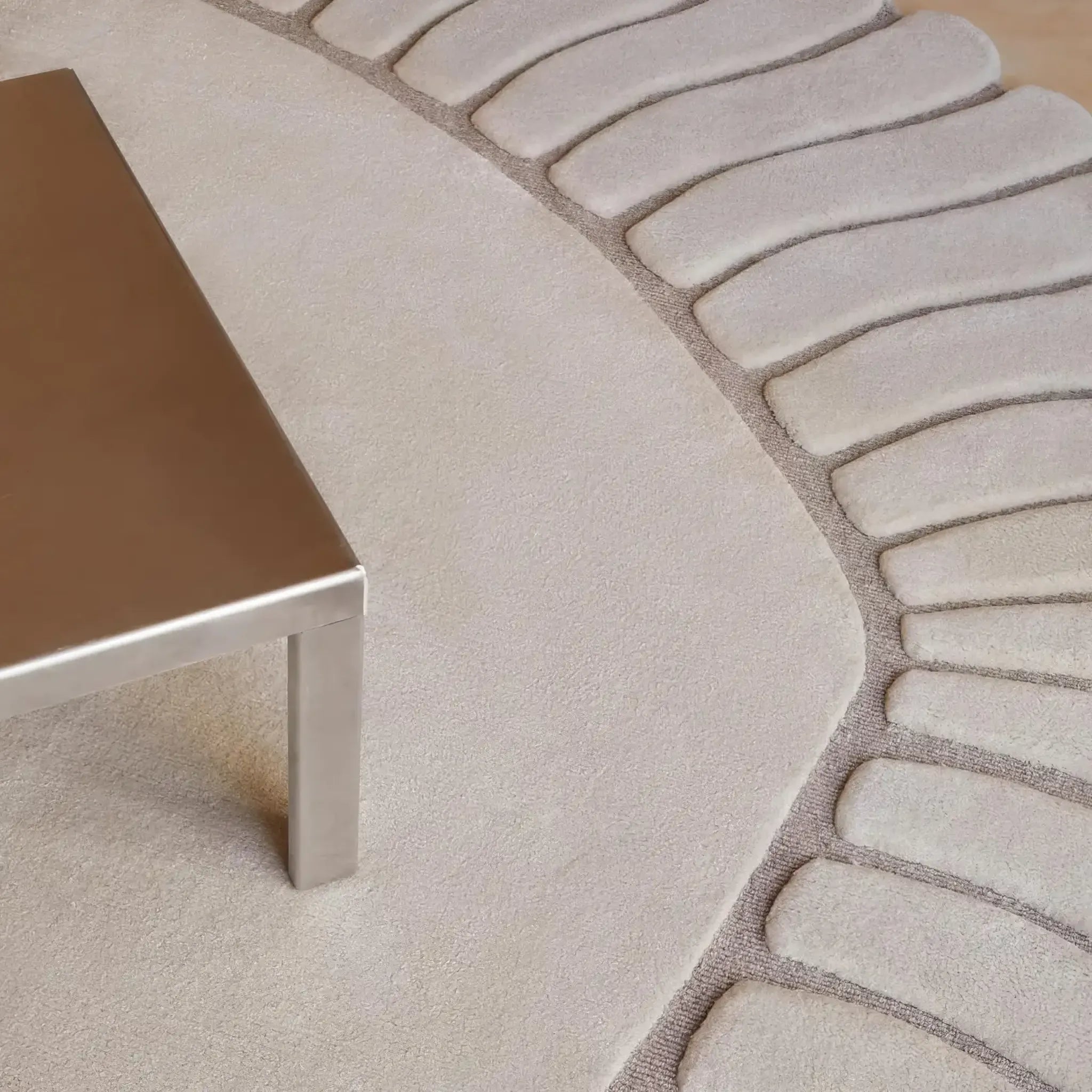 Close-up of Coquille Cream Seashell Shaped Sculpted Rug by Housenfriends