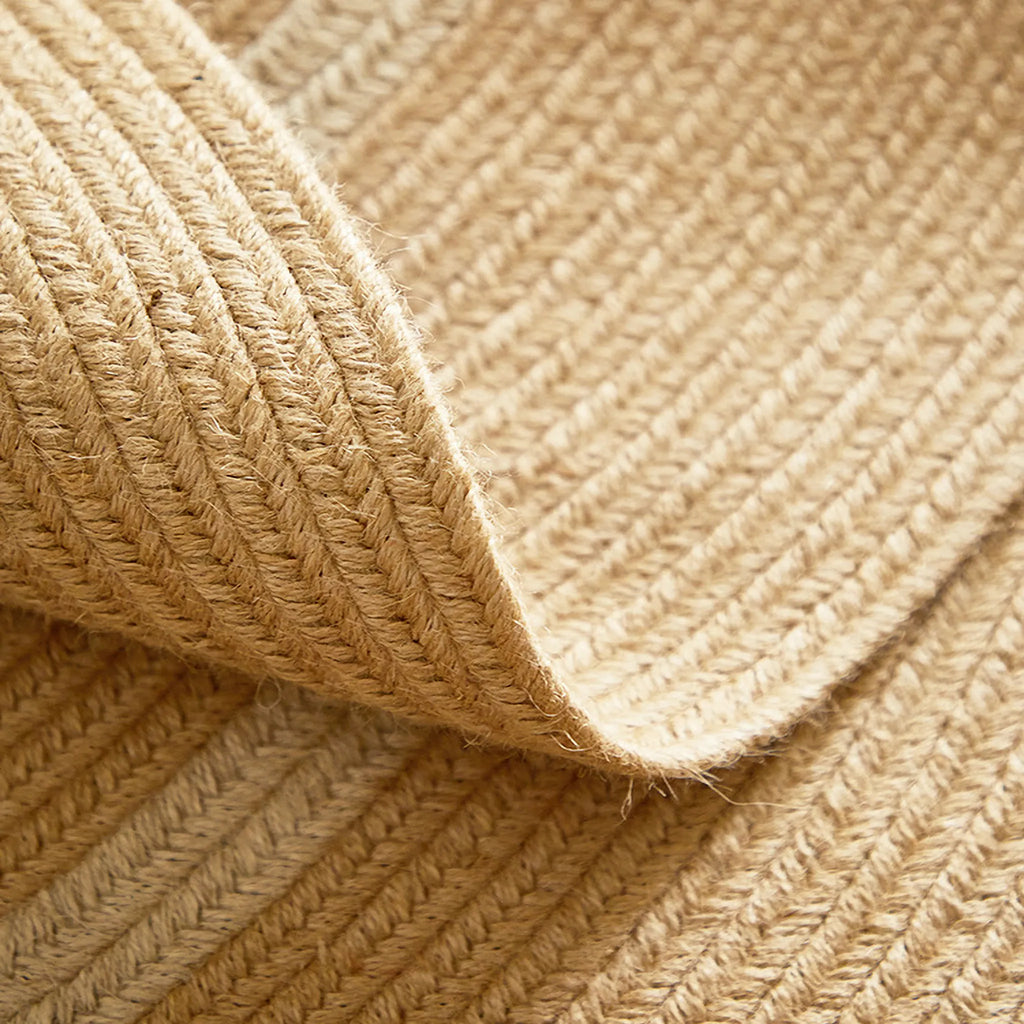 Close-up of Elina Beige & Natural Jute-Blend Braided Half Moon Rug Housenfriends