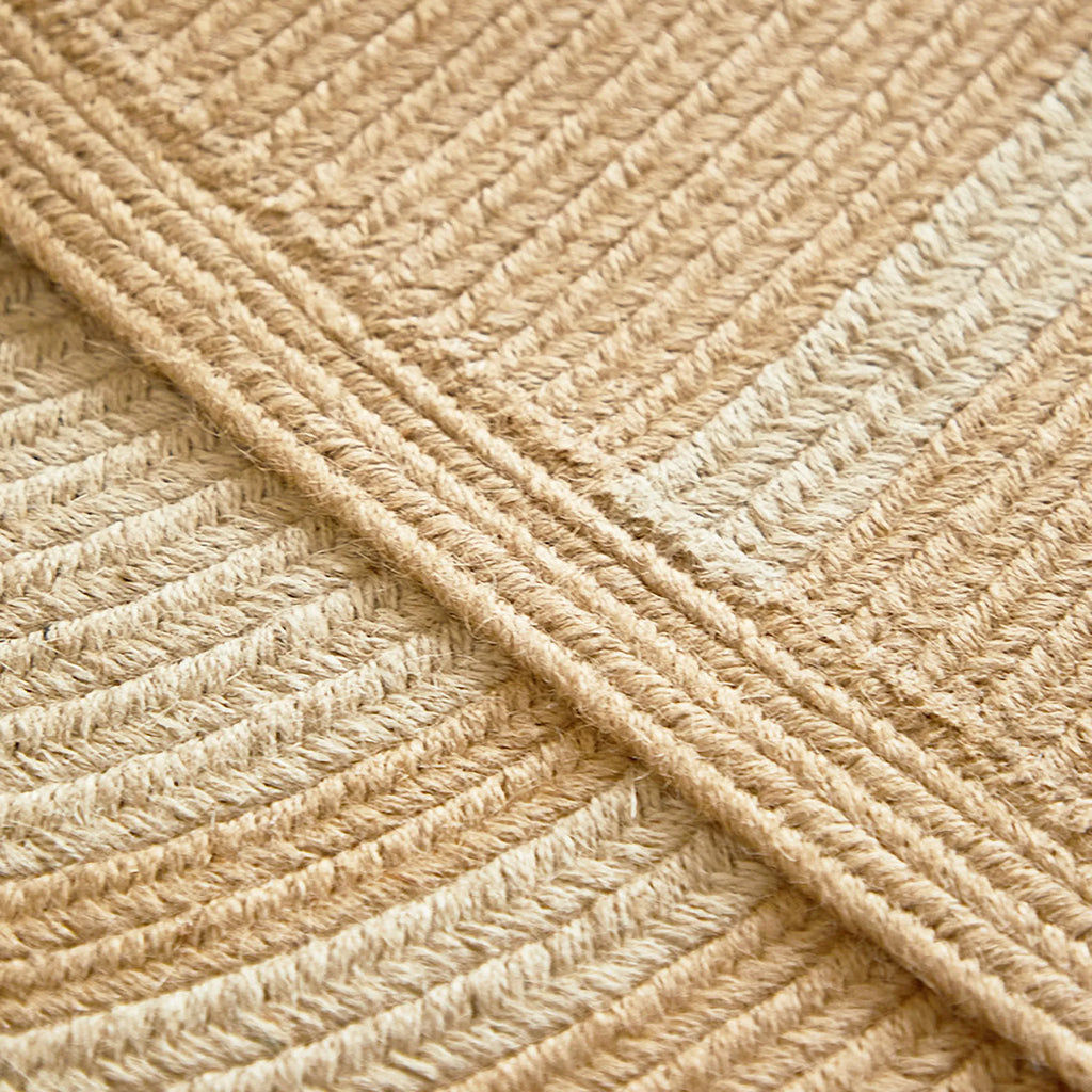 Close-up of Elina Beige & Natural Jute-Blend Braided Half Moon Rug, Housenfriends