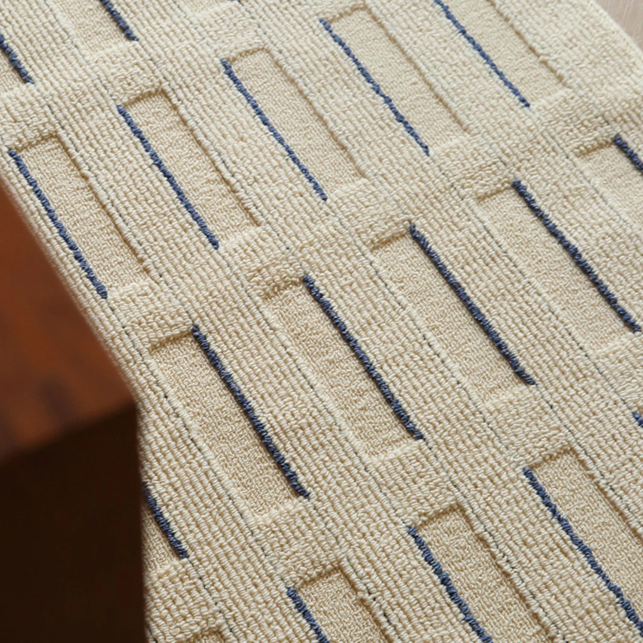 Housenfriends Elio Beige & Navy Striped High-Low Textured Rug close-up showing striped woven texture