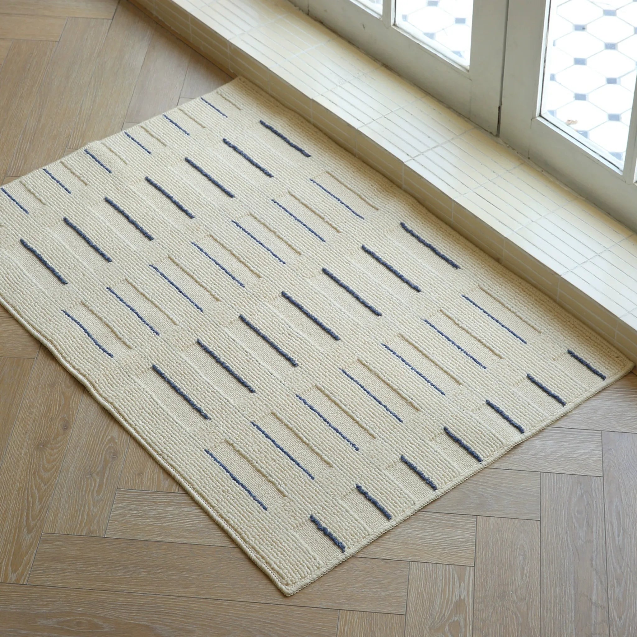 Housenfriends Elio Beige & Navy Striped High-Low Textured Rug in runner size by window