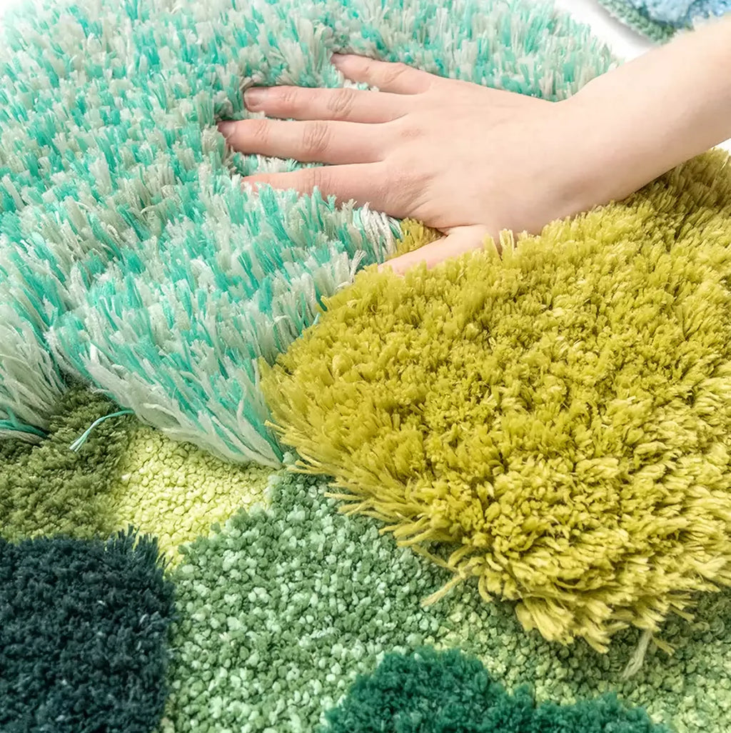 Elowen Mint Green Woodland Tufted Irregular Rug by Housenfriends, hand pressed into plush mint, olive and soft green fibres with textured high low pile