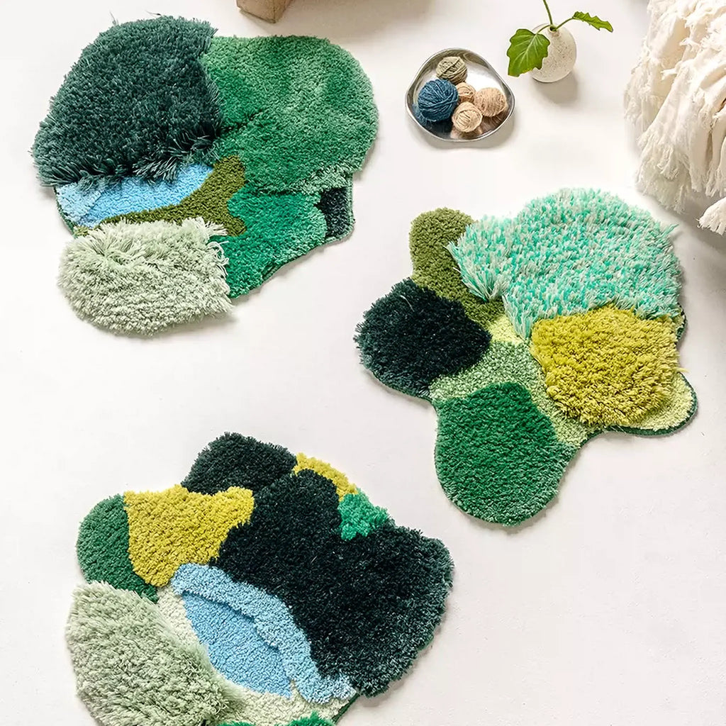 Nature-inspired irregular rugs by Housenfriends, featuring the Alder Green Pondside High Low Tufted Irregular Rug styled with coordinating textured green rug designs