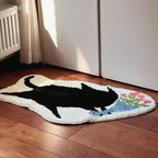 Floral Black Cat Shaped Designer Tufted Rug by Housenfriends on a wooden floor