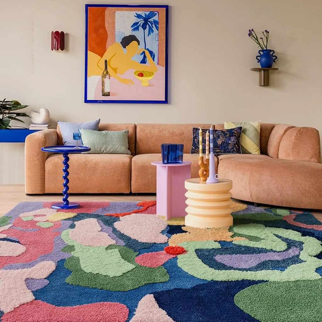 Freya Multicolour Moss Green Abstract Floral High Low Tufted Rug by Housenfriends in an artistic living room with a sofa, bold wall art and colourful abstract floral pattern.