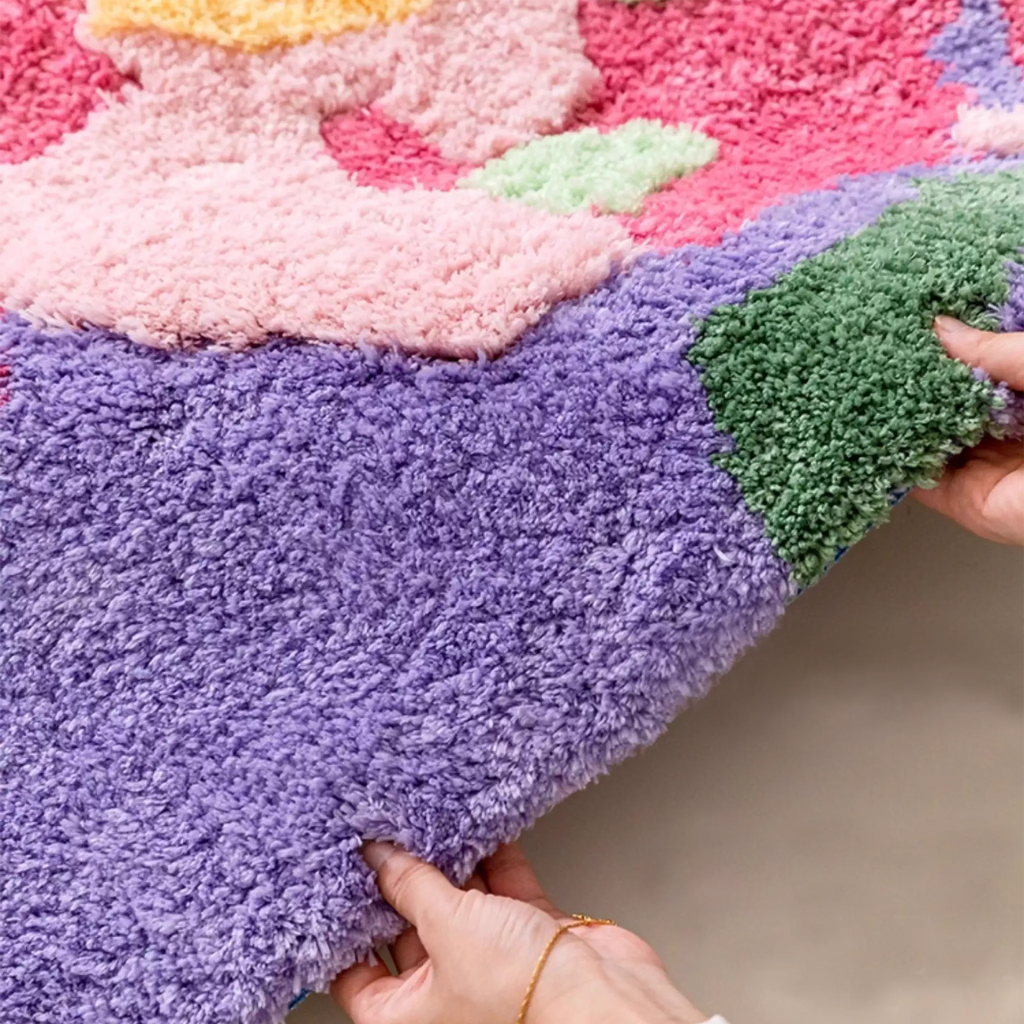 Freya multicolour moss green abstract floral high low tufted rug edge detail, thick dense tufting with sculpted cut pile, plush supportive feel and clean colour blocks