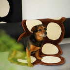 Dog sitting on Harper Brown and Cream Irregular Polka Dots Tufted Rug by Housenfriends