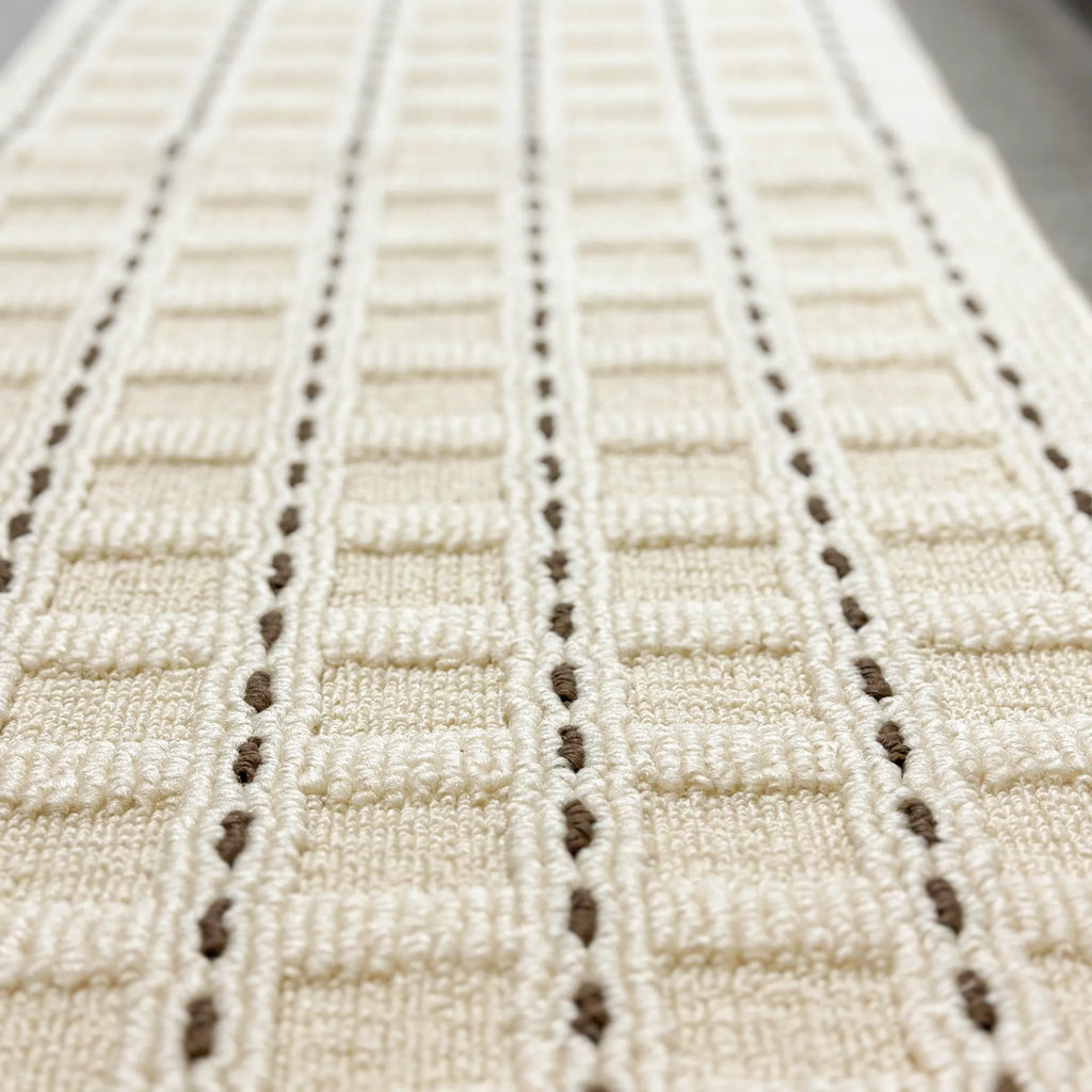 Housenfriends Ivo cream mocha grid runner rug detail with stitch-grid lines and textured surface