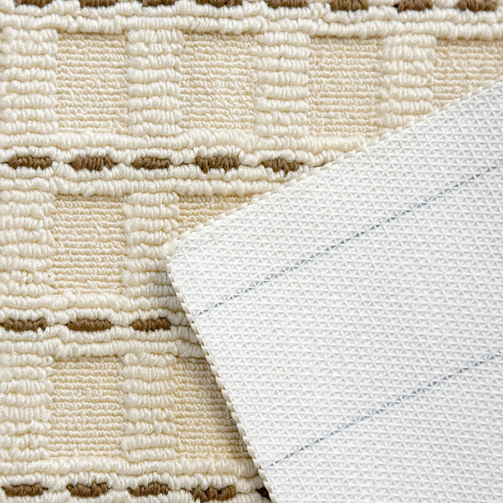 Housenfriends Ivo cream mocha high-low textured rug corner and backing detail with non-slip underside