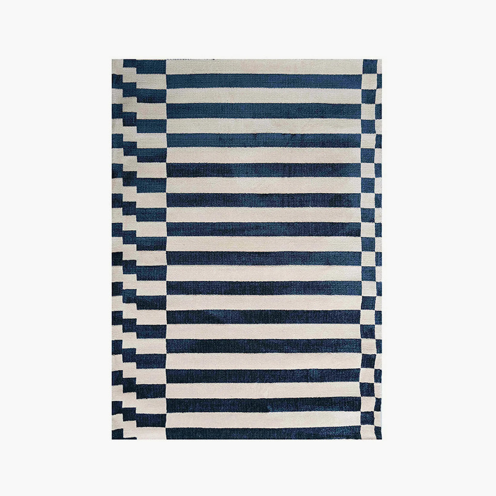Julian Blue & White Offset Striped Modern Rug by Housenfriends on a white background