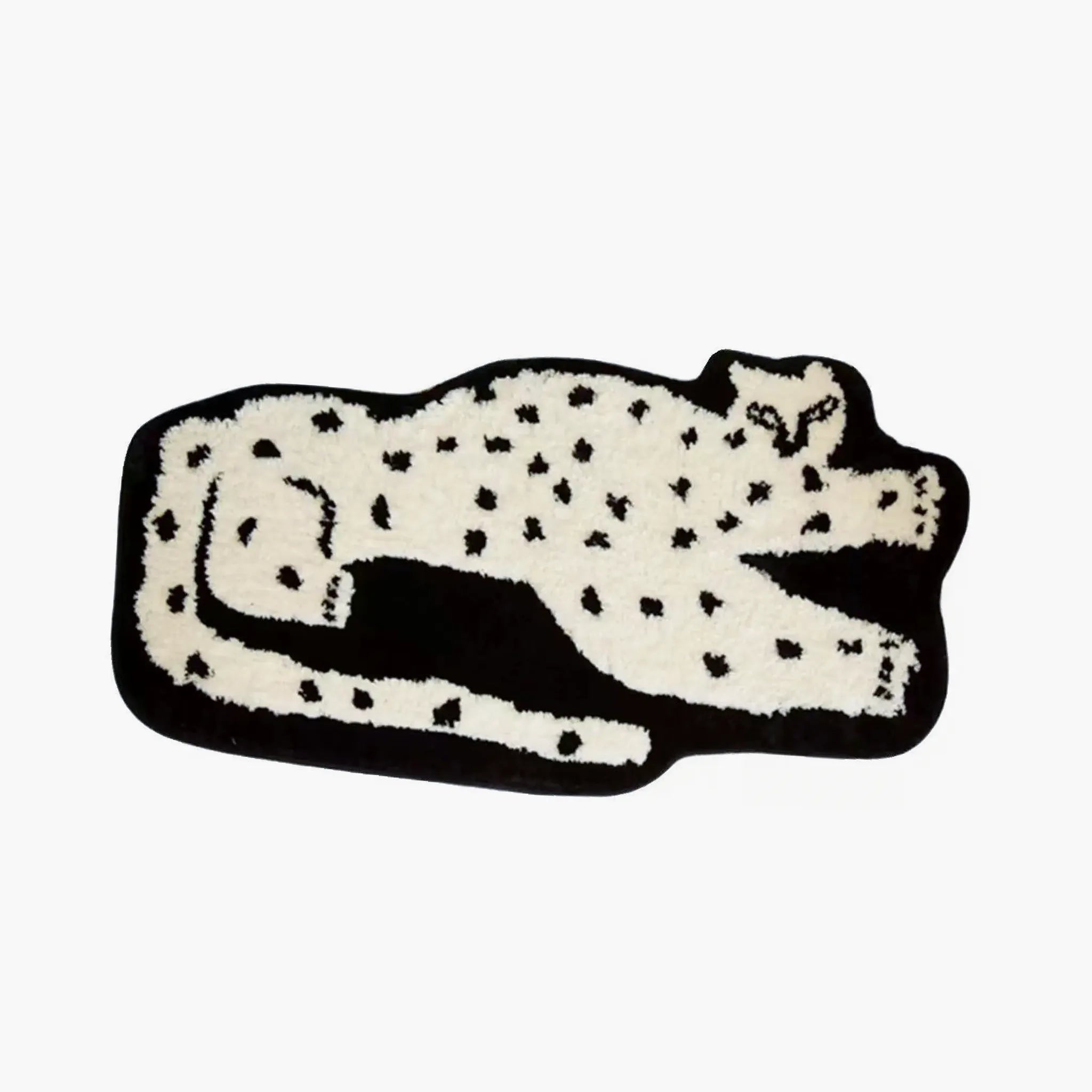 Layla Black Base White Leopard Shaped Tufted Rug by Housenfriends on a white background