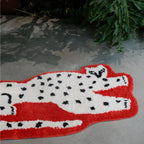 Layla Red Base White Leopard Shaped Tufted Rug by Housenfriends on a concrete floor