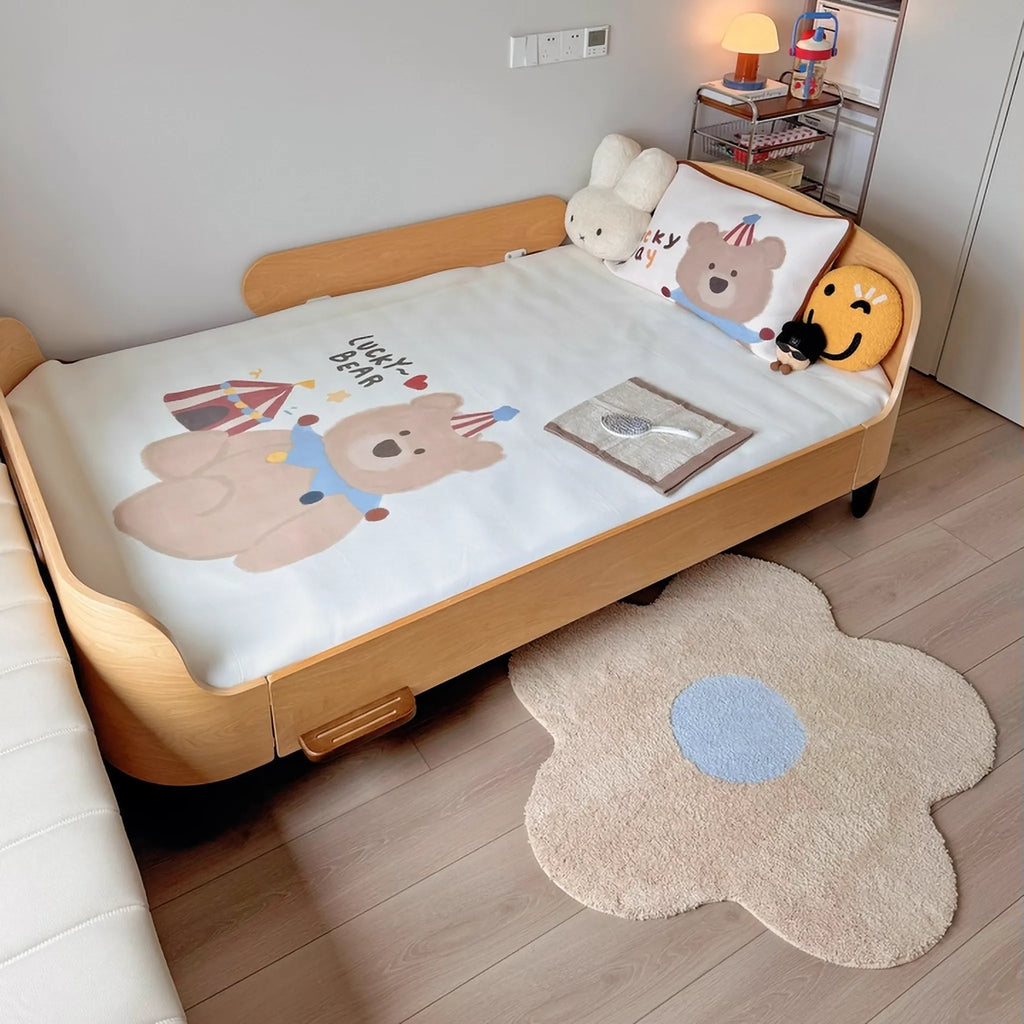 Maisie Cream & Pale Blue Floral Shaped Tufted Rug beside the bed, flower shaped small rug from Housenfriends