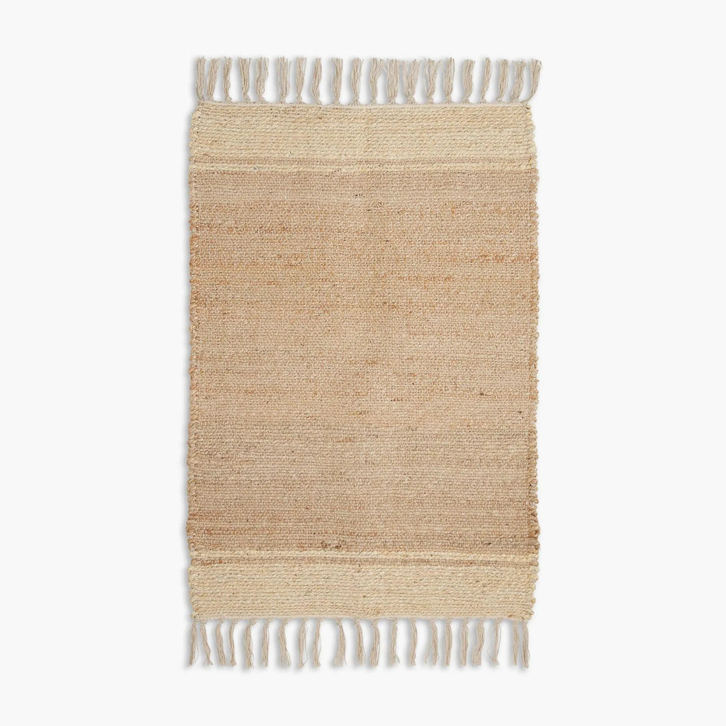 Maren Natural & Beige Fringed Handwoven Jute Rug on a light beige background