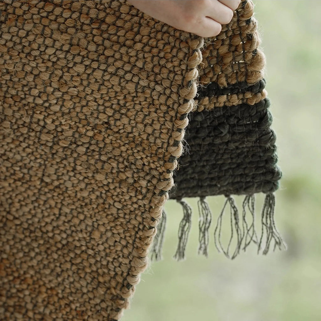 Maren handwoven jute rug by Housenfriends, edge detail showing chunky weave and natural fibre texture