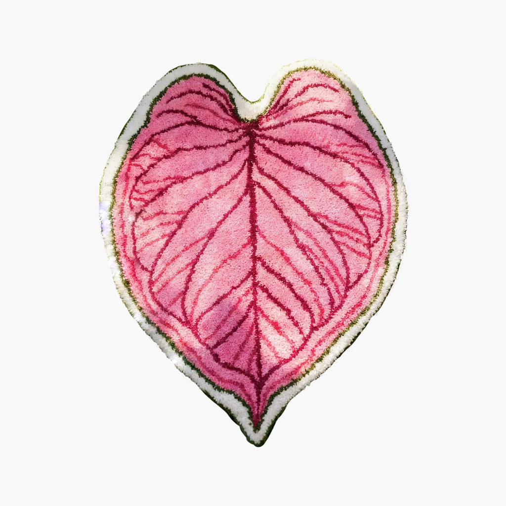 Mina Pink Botanical Heart Leaf Shaped Tufted Rug by Housenfriends on a plain white background.