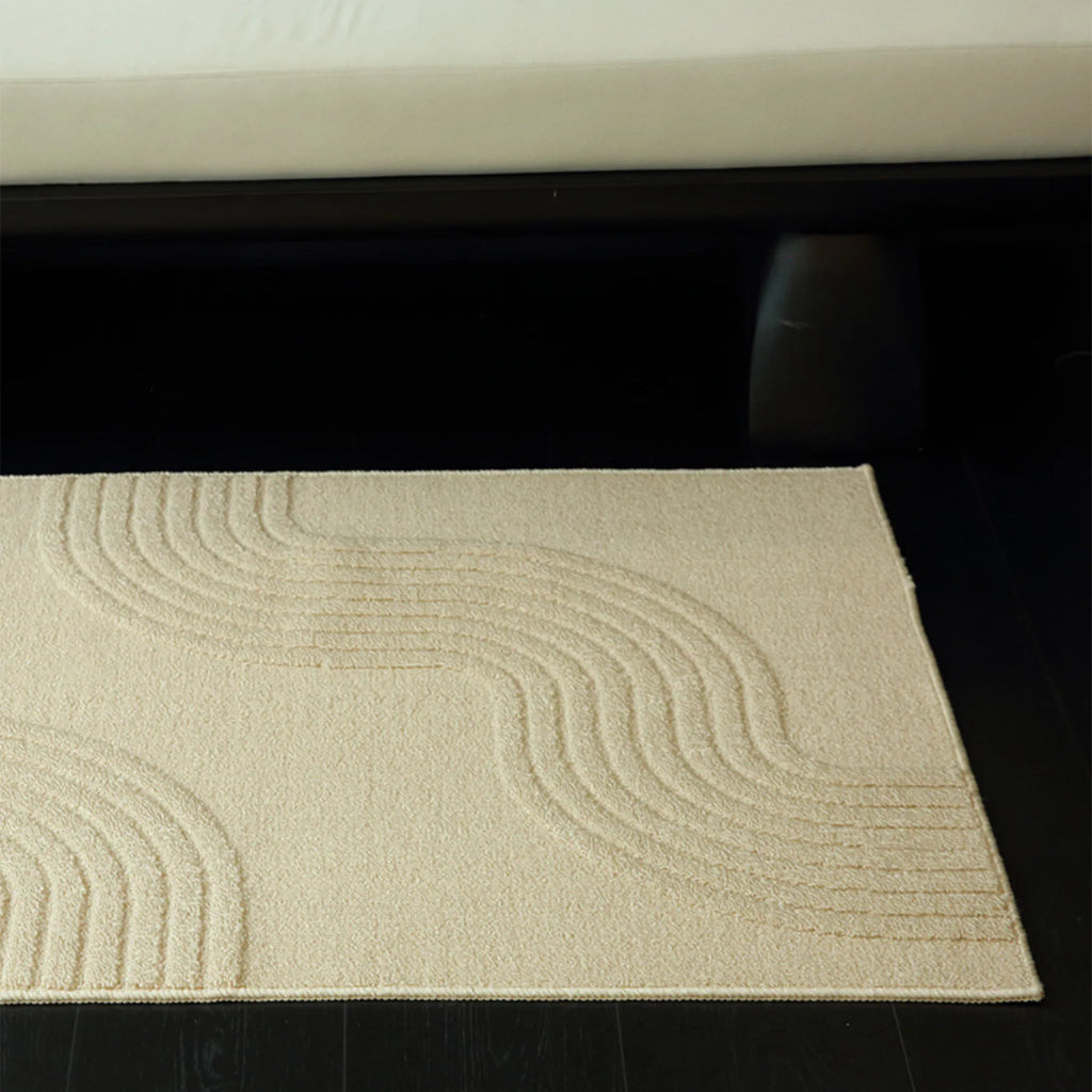 Housenfriends Nori cream wave-line rug styled beside a doorway