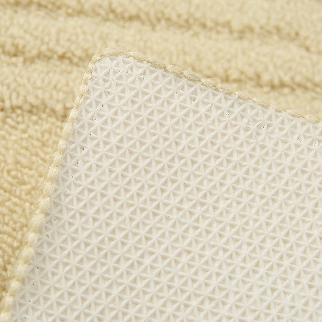 Housenfriends Nori cream rug non-slip backing detail