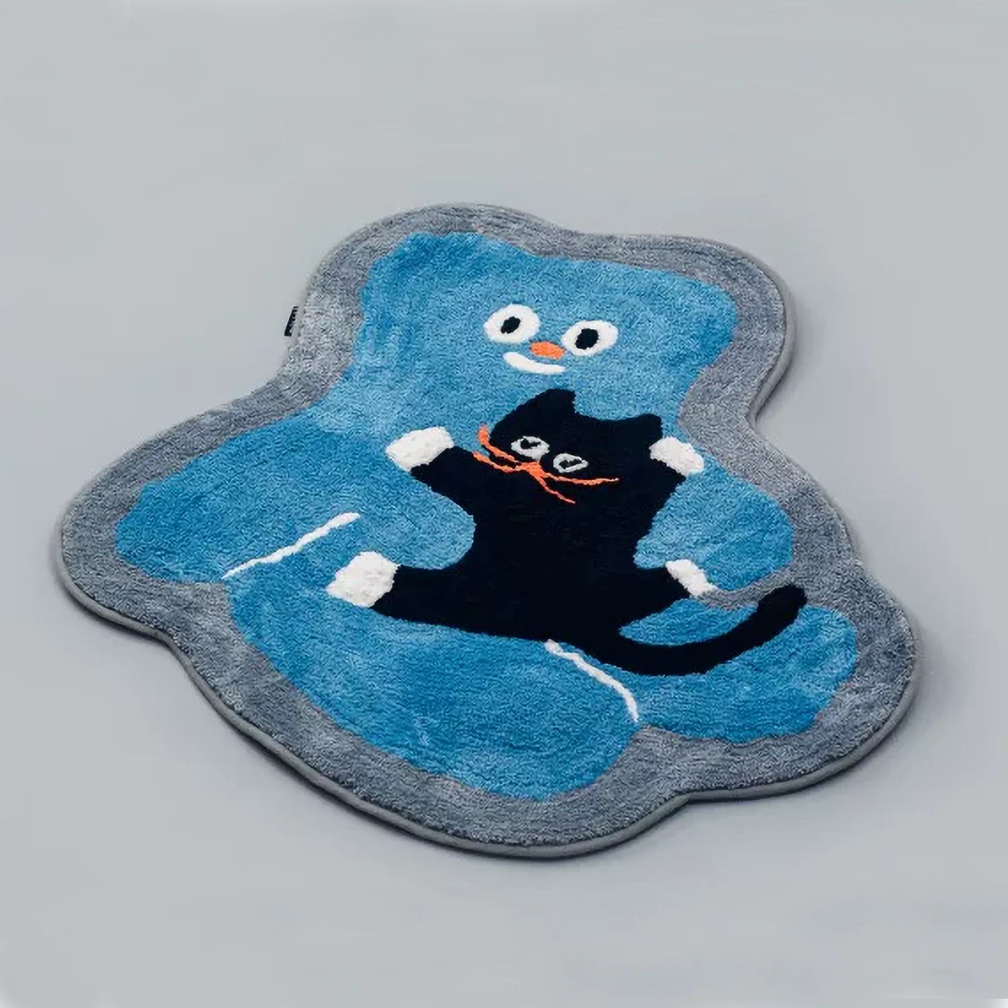 Otto Blue Bear and Black Cat Cuddling Whimsical Tufted Rug by Housenfriends on a gray background