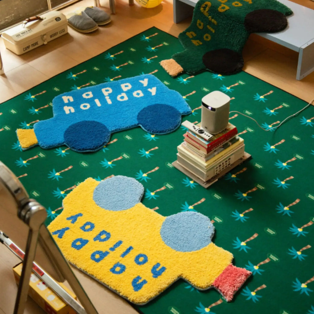 Pip Happy Holiday graphic car rugs by Housenfriends in yellow, blue and forest green, colourful shaped tufted rugs with playful word art for bedrooms and creative corners