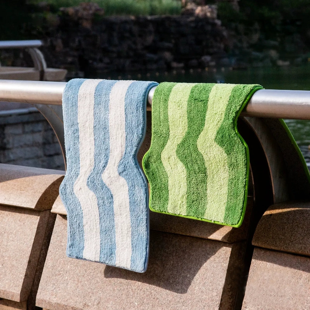 Rafi green lime wavy striped runner rug hanging with pastel blue striped rug, fresh tufted runner rug with wavy edge by Housenfriends