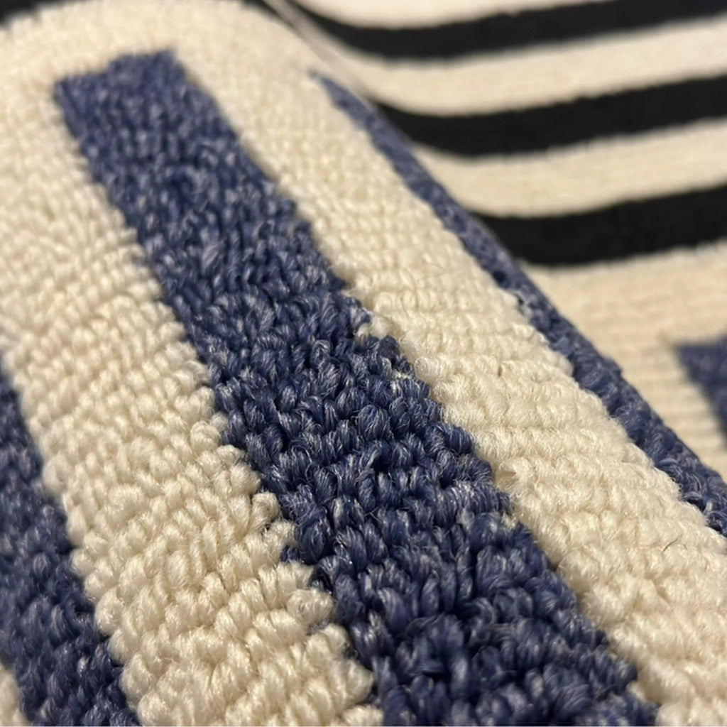 Close-up texture of the Soren Cream Black & Blue Block-Stripe Textured Rug by Housenfriends