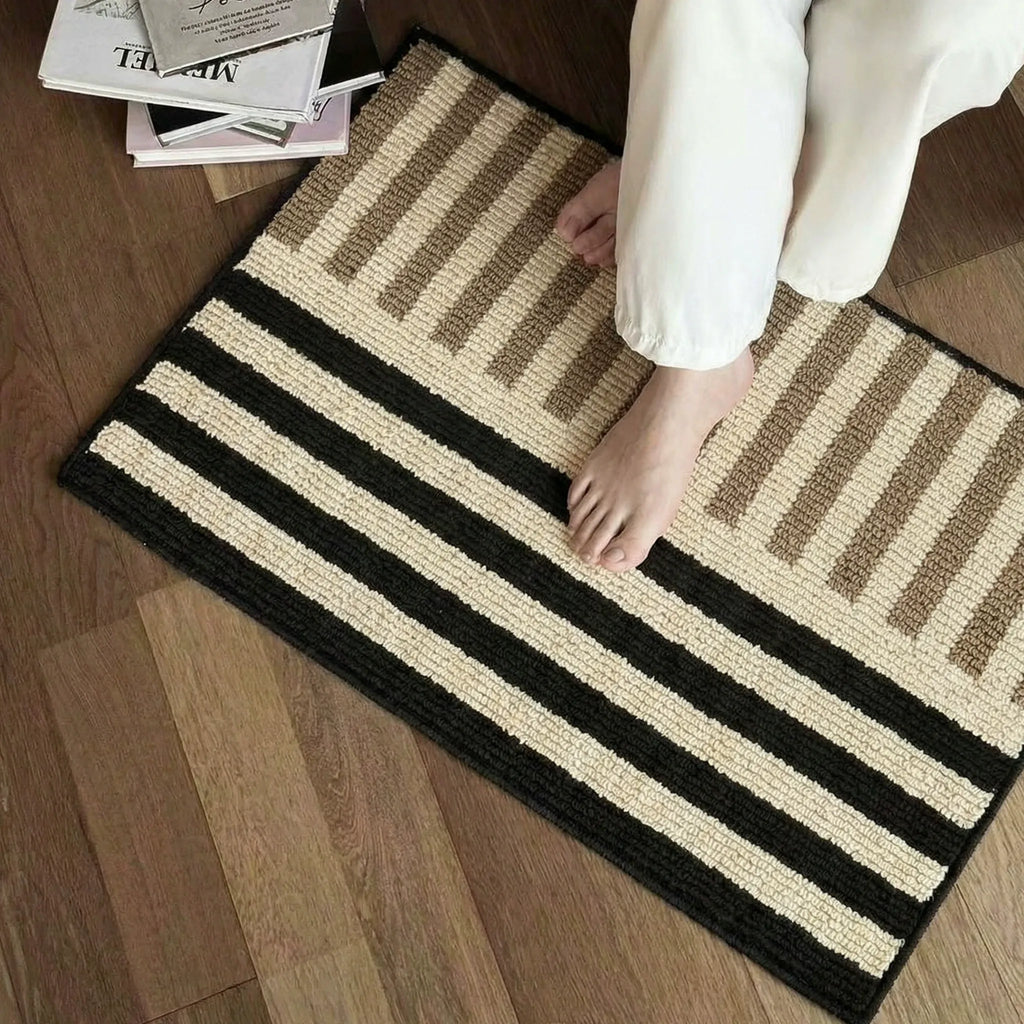 Soren Cream Black & Brown Block-Stripe Textured Rug by Housenfriends with foot-on-rug lifestyle view