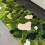 Sylvie moss green tufted high-low irregular runner rug on a smooth floor with off-white highlights by Housenfriends