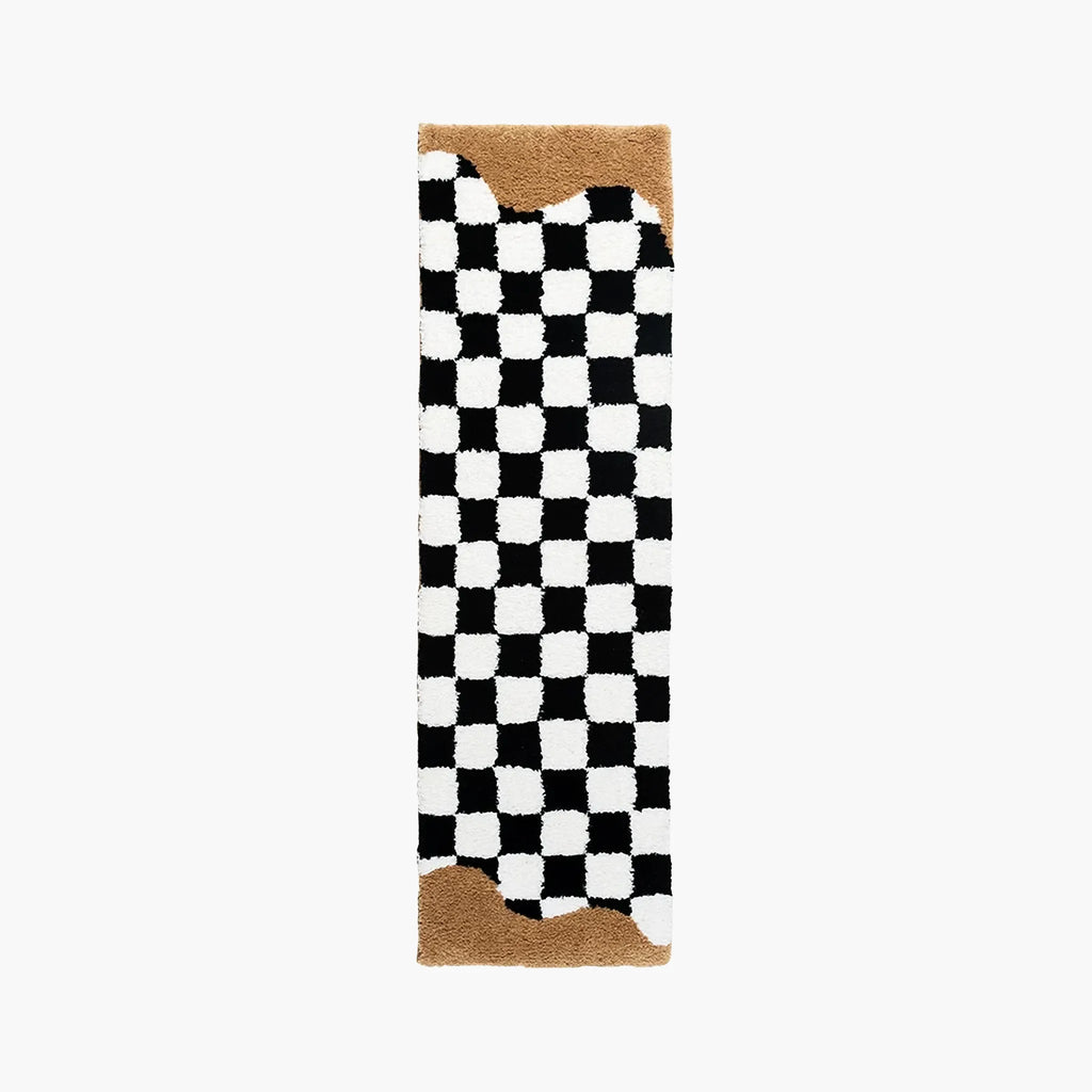Tess Black White Retro Checkered Bronze Wavy Edge Tufted Runner Rug by Housenfriends on a white background.